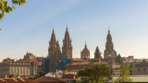 View of a Spanish city with historic towers that represent the setting of current surrogacy and privacy challenges for families