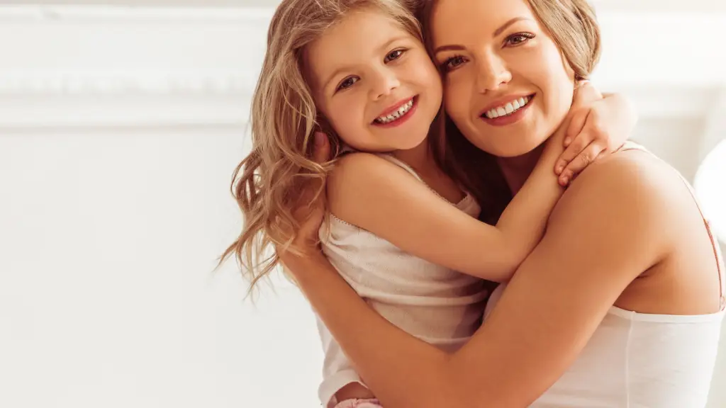 Mother holding her child, representing lived motherhood experience