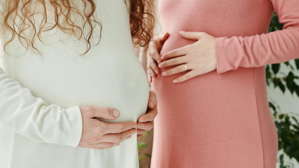 Surrogate mother carrying baby for intended parents