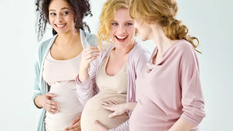 Surrogate at EDSI receiving support and care while learning about compensation in 2025